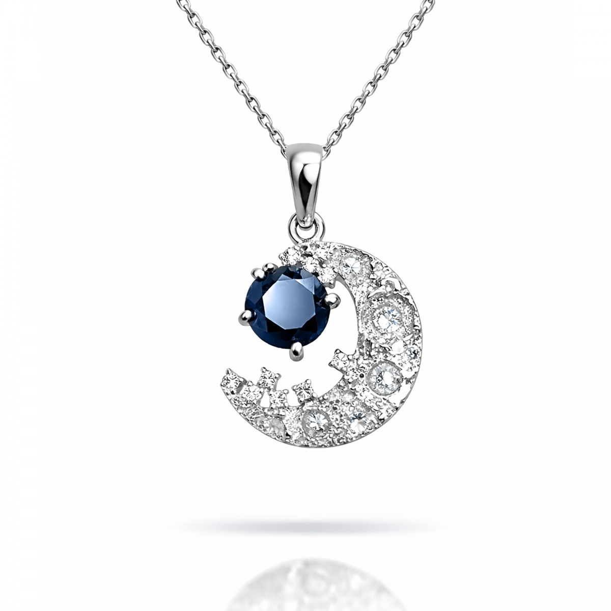 Кулон з білого золота з діамантами та сапфіром "Півмісяць"